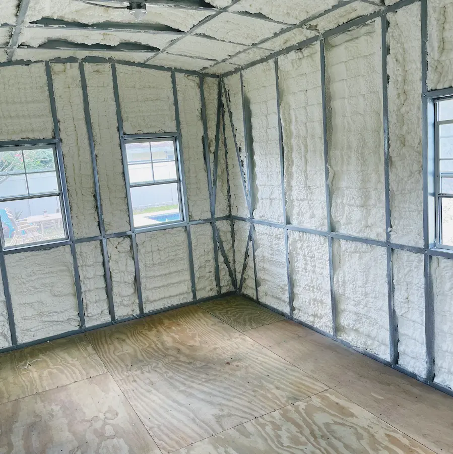 Closed-cell spray foam insulation applied to wall cavities in a residential project in Washington Terrace